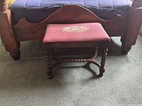 Stool positioned at foot of bed showing full structure
