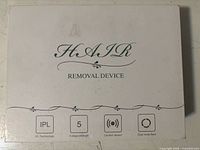 Closed box showing product name and feature icons