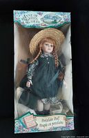 Doll in unopened display box showing branding and full figure
