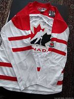 Front view of signed Team Canada jersey showing overall style and tags