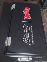 Top view showing Budweiser Prohibition Brew and Pringles logos on lid
