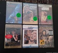 Front view of all six sealed DVDs