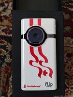 Front view of Flip Video MinoHD Scotiabank edition in box