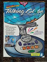 Front of GeoSafari Talking Globe retail box showing product image and features list