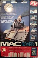Retail box front showing MAC Board 1 imagery and specifications.