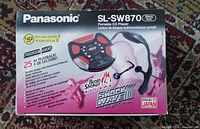 Front of retail box showing Panasonic SL-SW870 player and earphones, features and branding