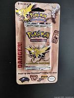 Front of sealed Fossil blister pack