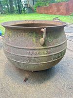 Full view of cauldron showing embossed capacity and exterior condition