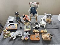 All 14 cat collectibles laid out on surface