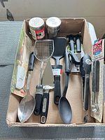 Box of assorted kitchen utensils
