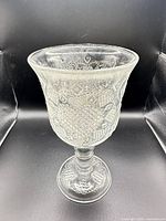 Full view of entire clear pressed glass goblet
