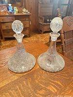 Front view of both decanters with stoppers in place