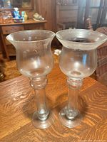 Front view of both glass vases showing shape and height