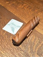 Kaleidoscope on stand next to information card