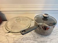 Both cookware pieces side by side showing overall condition