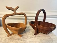 Both wooden collapsible baskets side by side