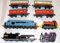 All eight train pieces laid out showing both sides