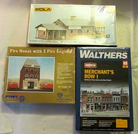 Front view of all three sealed kit boxes