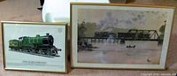 Both framed prints side by side