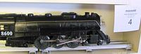 Side view of NYC 8600 locomotive on track