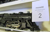 Left side profile of Lionel 2025 locomotive on track