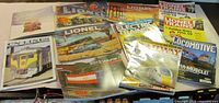 Overhead view of all publications laid out showing covers and titles