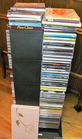 Full view of swivel tower loaded with CDs