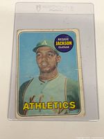 Front of 1970 Topps #140 Reggie Jackson card in holder