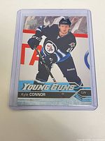 Front view of card in top loader