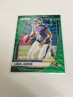 Front full view of Lamar Jackson Green Pulsar card