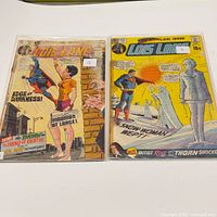 Front covers of both Lois Lane comics bagged and boarded
