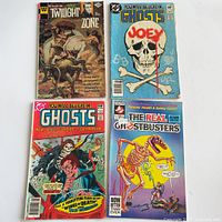 Front covers of all four comic books