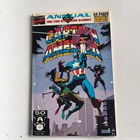 Front cover displaying title, artwork, 64 pages banner, 50th anniversary corner icon