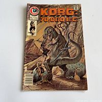 Front cover of comic showing title, publisher logo, issue number
