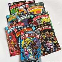All ten Omega Men comic books fanned out