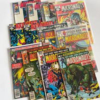 All 12 Micronauts issues spread, bagged