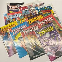 All 12 Thriller comic issues fanned out in protective bags