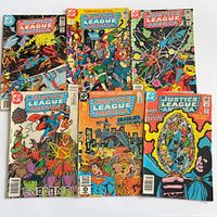 Front covers of all six Justice League of America CPV issues displayed