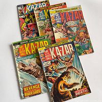 Front covers of all six comics fanned out