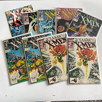 All nine bagged comics arranged to show covers