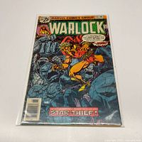 Front cover of Warlock #13 comic in bag