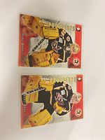 Front view of both Marc-André Fleury rookie cards