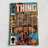 Front cover showing title, artwork, issue number and price