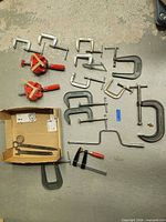 All clamps and tools laid out on floor