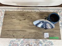 Top view showing wood-grain finish and overall rectangular shape