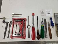 overview of assorted hand tools laid out left side