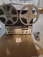Front view of ReVox tape recorder with two reels and power cord
