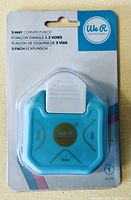 Front of sealed We R Memory Keepers 3-way corner punch package