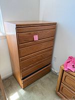Full view 5-drawer oak veneer dresser showing finish and drawer fronts