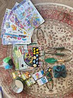 Entire lot laid out showing all items on rug